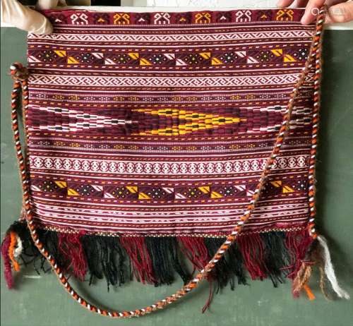 A TEKKE EMBROIDERY MADE INTO A SHOULDER BAG, together with t...