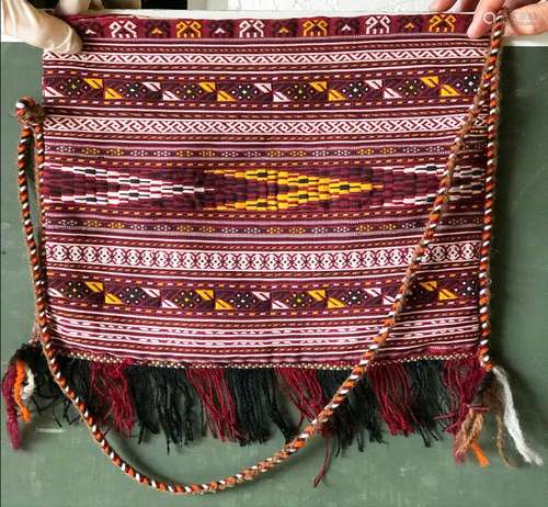 A TEKKE EMBROIDERY MADE INTO A SHOULDER BAG, together with t...