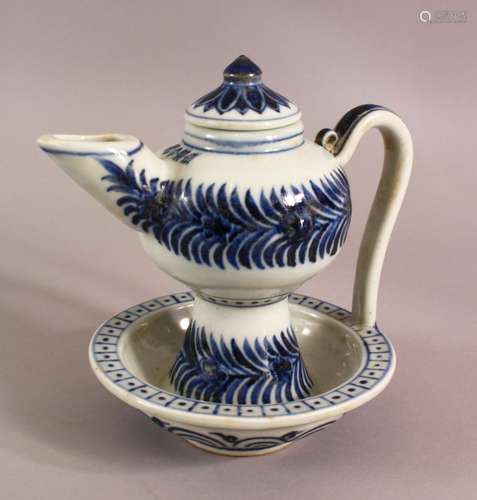 A CHINESE BLUE AND WHITE TEAPOT, painted with bands of folia...