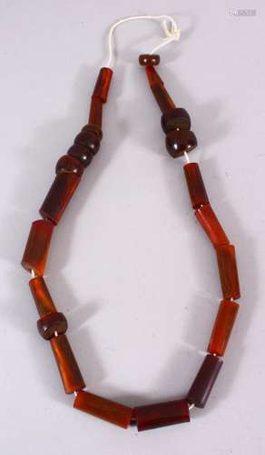 A SET OF 19TH / EARLY 20TH CENTURY CARVED HORN BEAD NECKLACE...