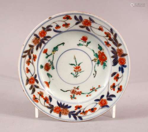 A SMALL JAPANESE IMARI CIRCULAR STAND, painted with a band o...