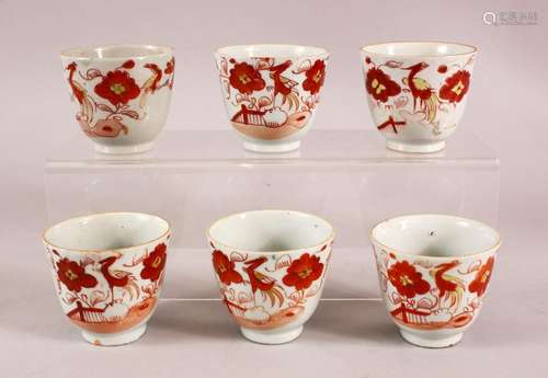 A SET OF SIX ARITA PORCELAIN CUPS, each painted with iron re...