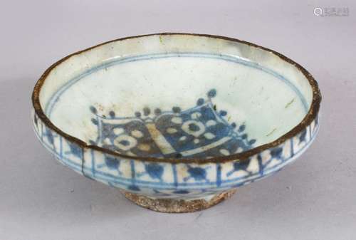 AN EARLY PERSIAN TIMURID BLUE AND WHITE GLAZED POTTERY BOWL,...