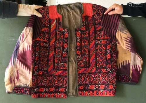A SHORT COTTON JACKET, made up with embroidered panels, appr...