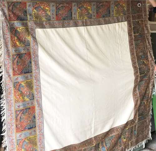 A EUROPEAN WOVEN SILK TURNOVER SHAWL, cream central panel wi...