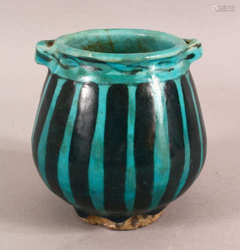 A SMALL RAQQA WARE POSSIBLY 14TH CENTURY TURQUOISE POT, 10cm...