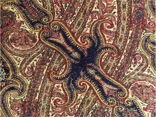 A RECTANGULAR PAISLEY DOUBLE SIDED SHAWL of typical design, ...