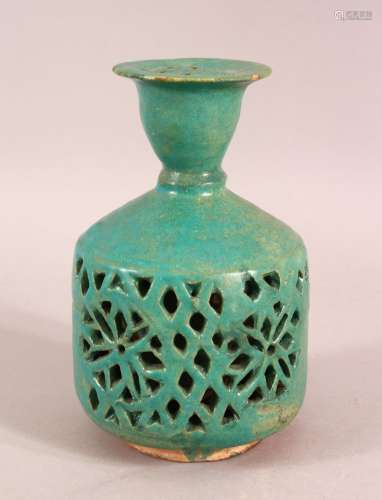 A KASHAN GLAZED TERRACOTTA WATER SPRINKLER, the body with op...