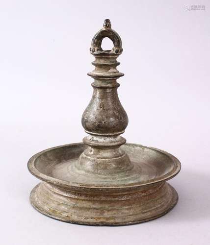 A GOOD INDIAN BRONZE OIL LAMP, Signed and dated to the centr...