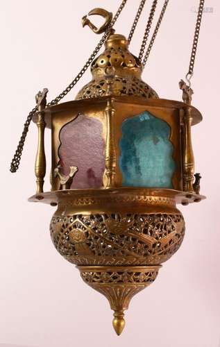 A GOOD BRASS QAJAR HANGING LAMP, with coloured glass panels,...