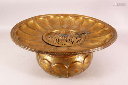 A LARGE 18TH/19TH CENTURY PERSIAN BRASS BASIN, with hinged l...