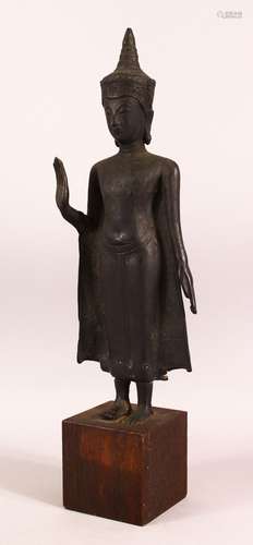 A TIBETAN CAST METAL / BRONZE FIGURE OF BUDDHA - in a stood ...