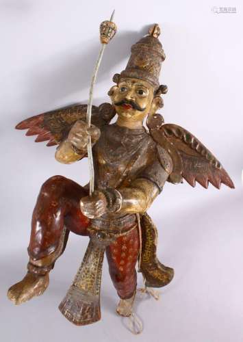 A 19TH CENTURY INDIAN / BURMESE CARVED WOOD FIGURE OF A WING...