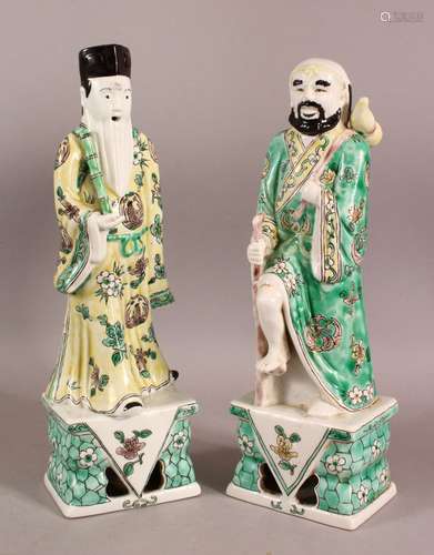 A PAIR OF CHINESE FAMILLE VERTE PORCELAIN IMMORTAL FIGURES, ...