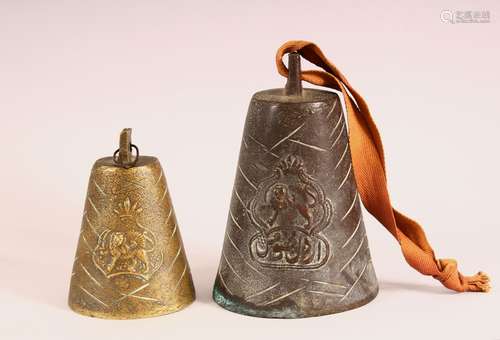 TWO BRONZE QAJAR CATTLE BELLS - each with raised lion decora...