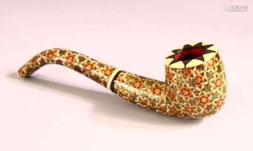 AN INDIAN GILT AND ENAMEL DECORATED BONE PIPE, 13cm long.