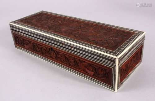 A 19TH CENTURY INDIAN CARVED AND INLAID SANDALWOOD BOX, the ...