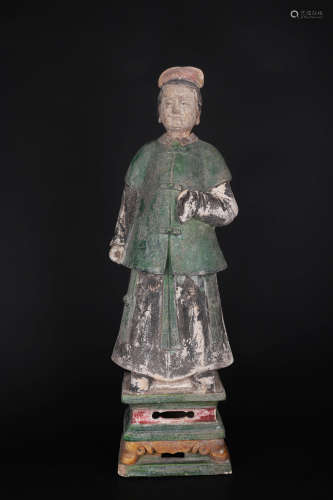 A SANCAI GLAZE FIGURE OF ATTENDANT