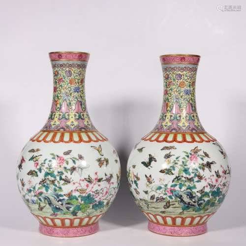 A PAIR OF FAMILLE ROSE FLOWERS AND BUTTERFLY GLOBULAR VASES