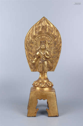 A GILT BRONZE FIGURE BUDDHA AND COVER