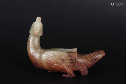 A BROWNISH JADE BIRD ORNAMENT