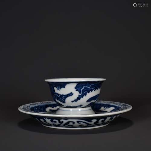 A BLUE AND WHITE DRAGON CUP AND CUP STAND