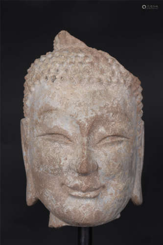 A CARVED GREY STONE FIGURE OF BUDDHA HEAD