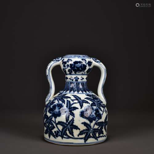 A BLUE AND WHITE FLORAL DOUBLE LOOP-HANDLE POT