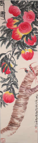 A CHINESE PAINTING SCROLL OF PEACHES, SIGNED QI BAISHI