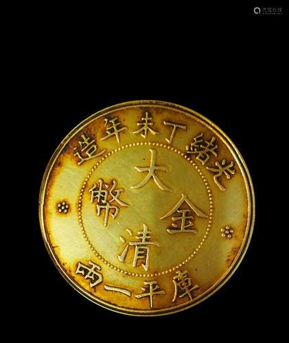 A CHINESE GOLD COIN, QING DYNASTY