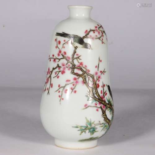 A FAMILLE ROSE PRUNUS AND MAGPIE MELON-SHAPED VASE