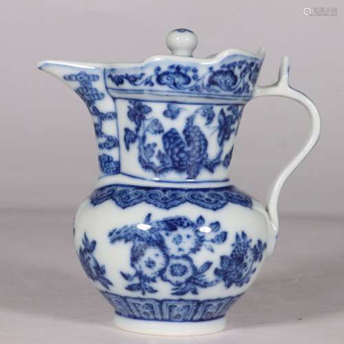 A BLUE AND WHITE FLORAL MONK’S CAP JUG