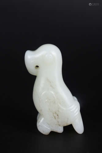 A CARVED WHITE JADE FIGURE OF BIRD