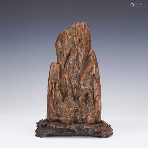 A CARVED ALOES-WOOD BLOCK