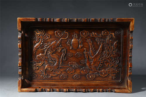 A CARVED HUANGHUALI DRAGON AND PHOENIX TEA TRAY