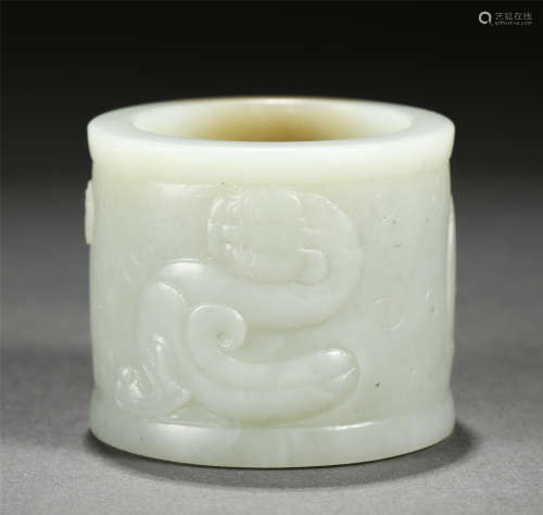 A CARVED WHITE JADE DECORATION