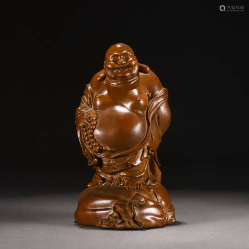 A CARVED BOXWOOD STANDING BUDAI