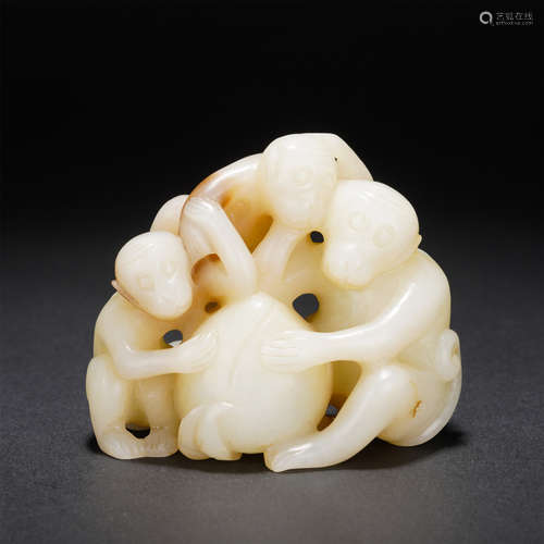 A CARVED WHITE JADE MONKEYS GROUP