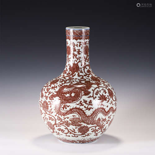 A COPPER RED DRAGON GLOULAR VASE