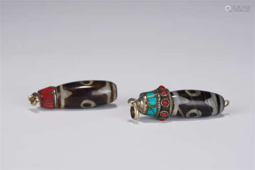 TWO TIBETAN DZI BEADS