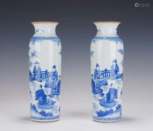PAIR BLUE AND WHITE FIGURAL SLEEVE VASES