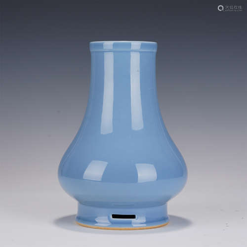 A SKY BLUE GLAZED BOTTLE VASE