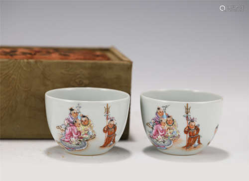 PAIR FAMILLE ROSE FIGURAL CUPS