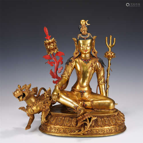 A GILT-BRONZE SEATED JAMBHALA