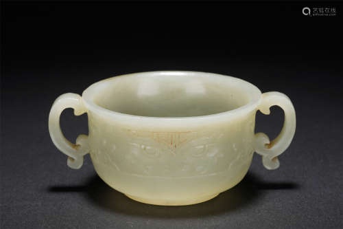 A CARVED WHITE JADE CUP WITH DOUBLE HANDLES