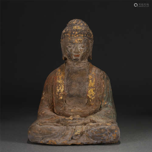 A POLYCHROME WOODEN SEATED BUDDHA