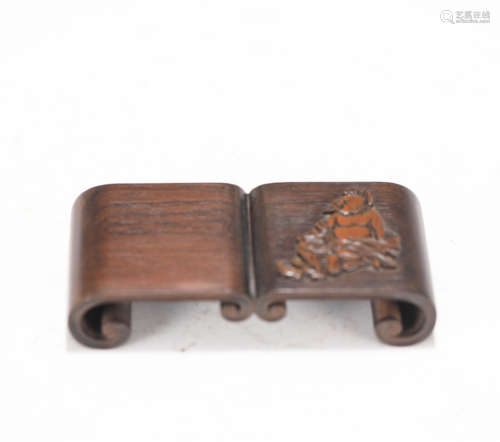 A CARVED BAMBOO BRUSHREST