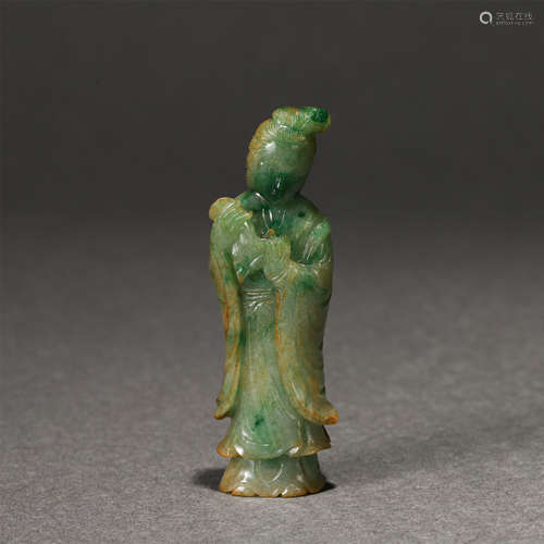 A CARVED JADEITE STANDING IMMORTAL