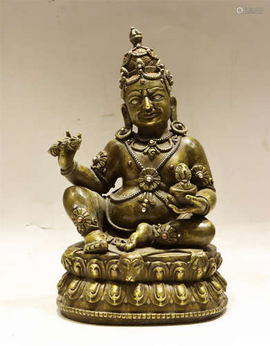 A BRONZE SEATED TILOPA PALA STYLE