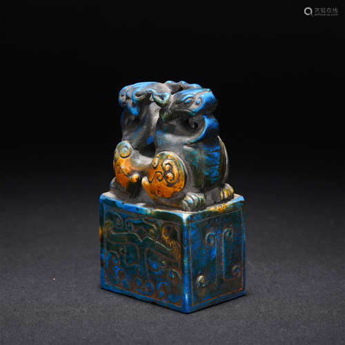 A PEKIN GLASS BEAST SEAL